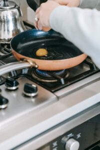 frying of an egg on a pan