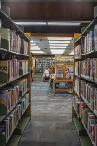 cozy library aisle with studying adults