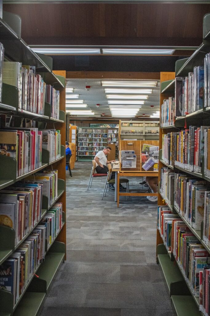 cozy library aisle with studying adults