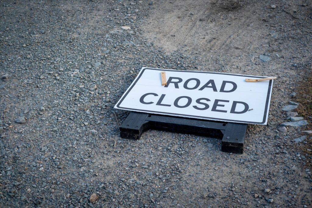 sign lying on the ground