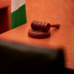 judicial gavel on courtroom desk legal justice