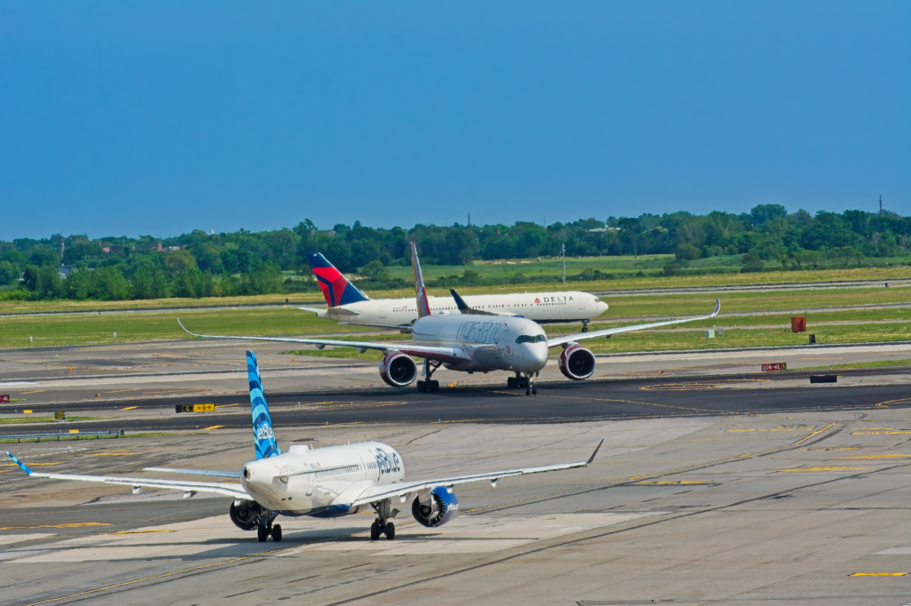 commercial airplanes at new york airport runway