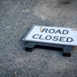 sign lying on the ground