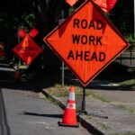 roadwork warning sign on street