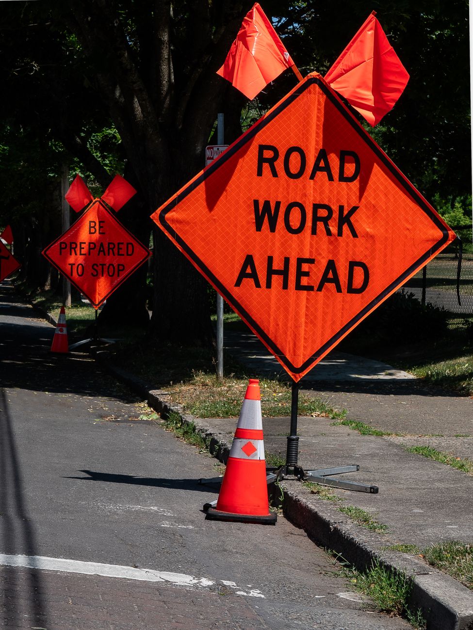 roadwork warning sign on street